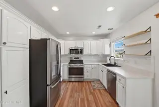 1281 Spring Lake Drive, Southport, NC 28461 — 3-bedroom home, Southport, NC, photo 10 of 46: Kitchen – Open & Bright