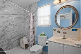 118 NE 31st Street, Oak Island, NC 28465 – photo 23: 13-web-or-mls-DSC02644