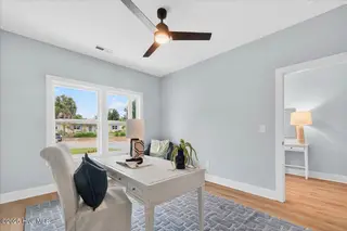 137 NE 3rd Street, Oak Island, NC 28465 – photo 19: Bedroom/Office