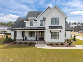 711 Rupert Drive, Greenville, NC 27858 – photo 1: 1-web-or-mls-DJI_20260318105247_0001_D