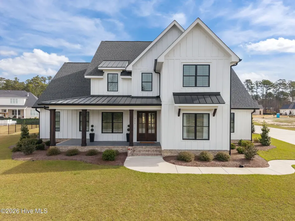 711 Rupert Drive, Greenville, NC 27858 – photo 1 of 65: 1-web-or-mls-DJI_20260318105247_0001_D