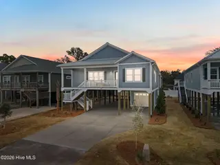 204 NE 33rd Street, Oak Island, NC 28465 – photo 1: 1-web-or-mls-cammediallc.com-2