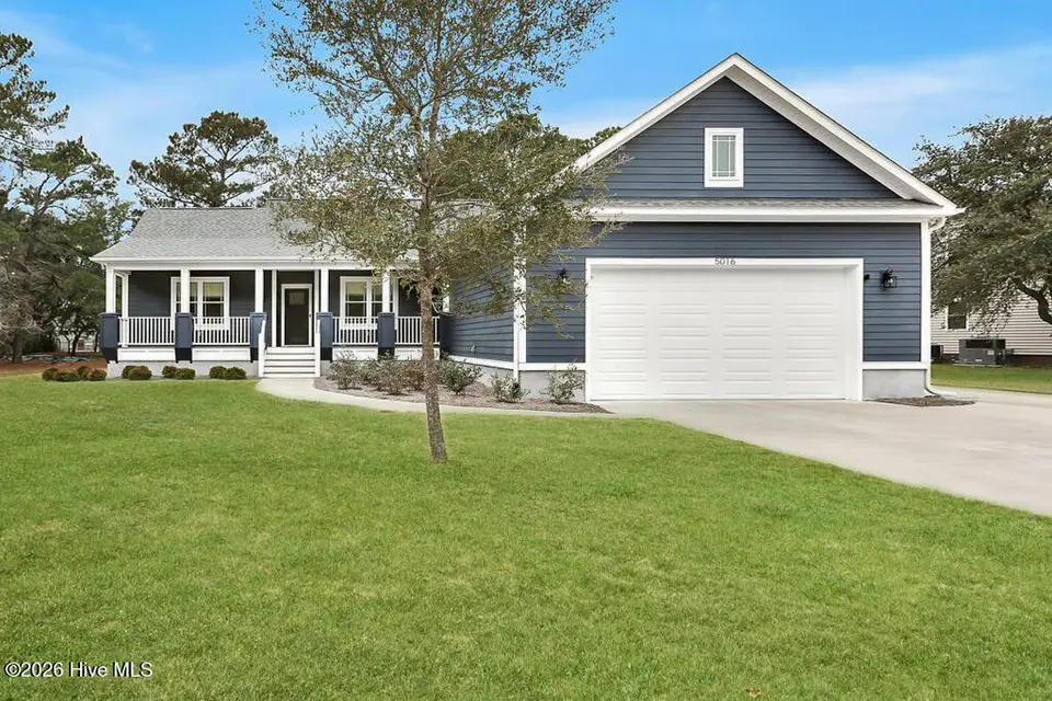 5016 Robert Ruark Drive SE, Southport, NC 28461 – photo 1 of 47: Spring 5016RobertRuarkDriveSoutheast-1 (