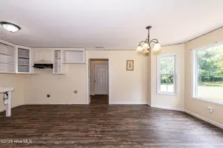 127 Rodney Lanier Road, Chinquapin, NC 28521 — 3-bedroom home, Chinquapin, NC, photo 19 of 61: Dining area and kitchen