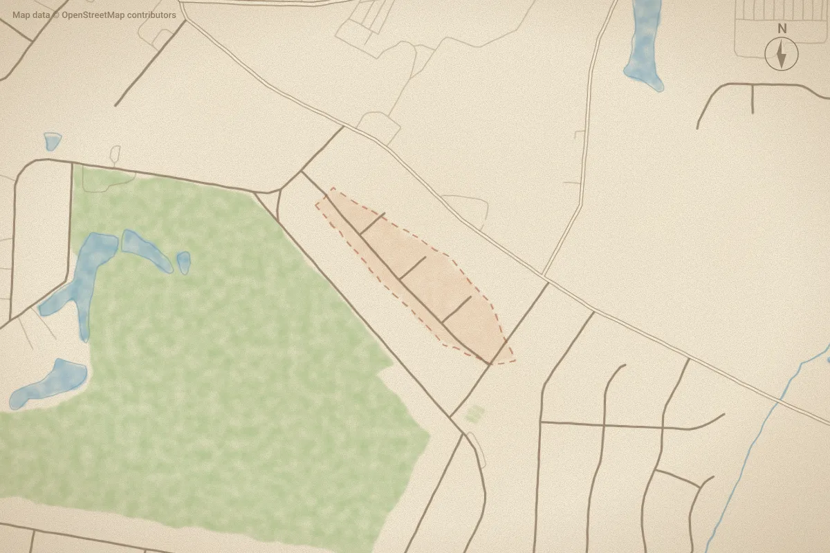Watercolor map of Fairfield in Nashville, NC, showing its streets, water and surroundings