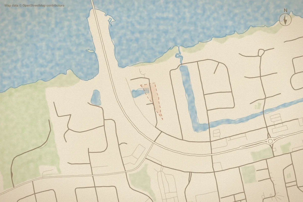 Watercolor map of Sunset Landing in Emerald Isle, NC, showing its streets, water and surroundings