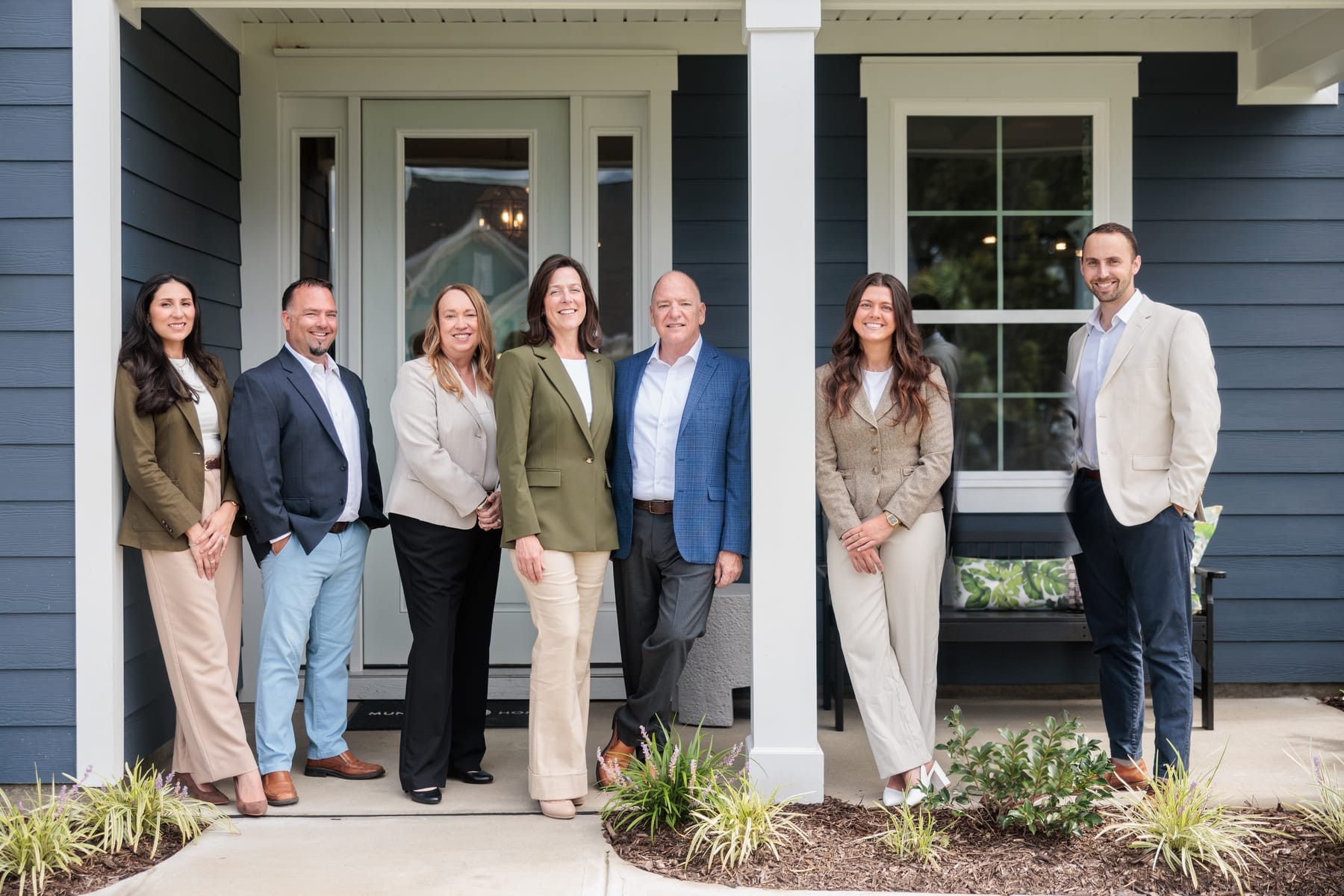 The Buddy Blake Team, with Buddy and Erin at the center
